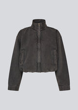 High-neck denim jacket with zipper in black. The UdolineMD Jacket features a cool washed denim look with long sleeves, practical side pockets, and an elasticated waist that creates a modern and relaxed expression