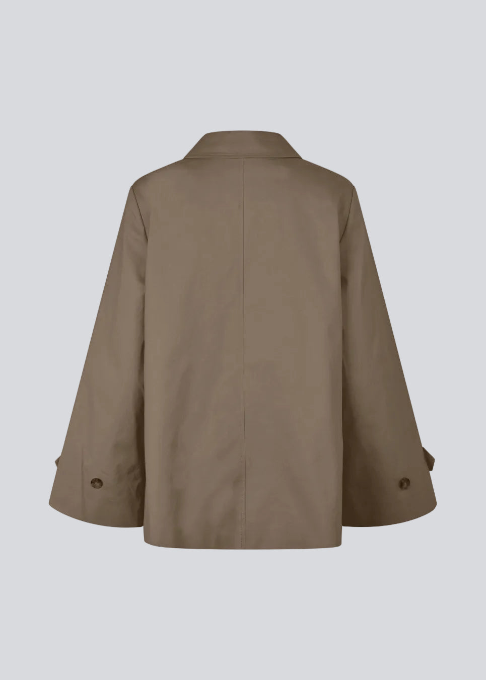 Short jacket in brown with trench coat inspiration. The Umamd Jacket features a shirt collar, button closure, side pockets, and an adjustable elastic hem – a modern take on a classic silhouette.

Material:
97% Cotton
3% Elastane

Lining:
100% Polyester