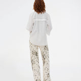 Printed jeans in soft cotton denim. The UlianaMD Jeans feature straight legs, a concealed zip fastening, and front and back pockets – a modern twist on a classic. The model is 175 cm and wears a size S/36.

Style the pants with the matching shirt: ulianamd shirt

Material:
97% Cotton
3% Elastane