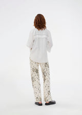 Printed jeans in soft cotton denim. The UlianaMD Jeans feature straight legs, a concealed zip fastening, and front and back pockets – a modern twist on a classic. The model is 175 cm and wears a size S/36.

Style the pants with the matching shirt: ulianamd shirt

Material:
97% Cotton
3% Elastane