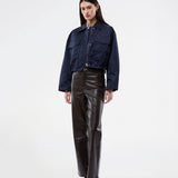 Short jacket in navy with modern and practical details. The Ulrikkemd jacket features a classic collar, large front flap pockets, an adjustable drawstring at the waist, and is crafted from glossy nylon that gives it a sleek and sporty look. The model is 175 cm and wears a size S/36.

Material:
100% Nylon

Lining:
100% Polyester

Filling:
100% Polyester