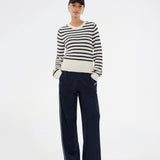 Classic striped sweater in navy and cream. The UlvaMD Stripe O-neck is made from 100% organic cotton and features a round neckline, ribbed trims, and a soft, comfortable fit. A timeless choice for a relaxed and refined everyday look. The model is 175 cm and wears a size S/36.

Material:
100% Organic Cotton
