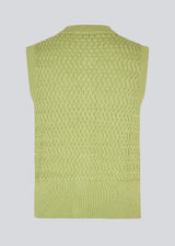Knitted sleeveless top in green made from 100% organic cotton. The UlvaMD Top is crafted in a beautiful herringbone knit with a wide ribbed hem and trim. The contrast buttons and round neckline give the top a refined and feminine look. The model is 175 cm and wears a size S/36.


Material:
100% Organic Cotton