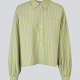Striped shirt in green with balloon sleeves and feminine details. The UmekoMD Shirt features chest pockets, a classic collar, and button closure – an updated take on the timeless shirt. The model is 175 cm and wears a size S/36.

Material:
73% Cotton
27% Polyester