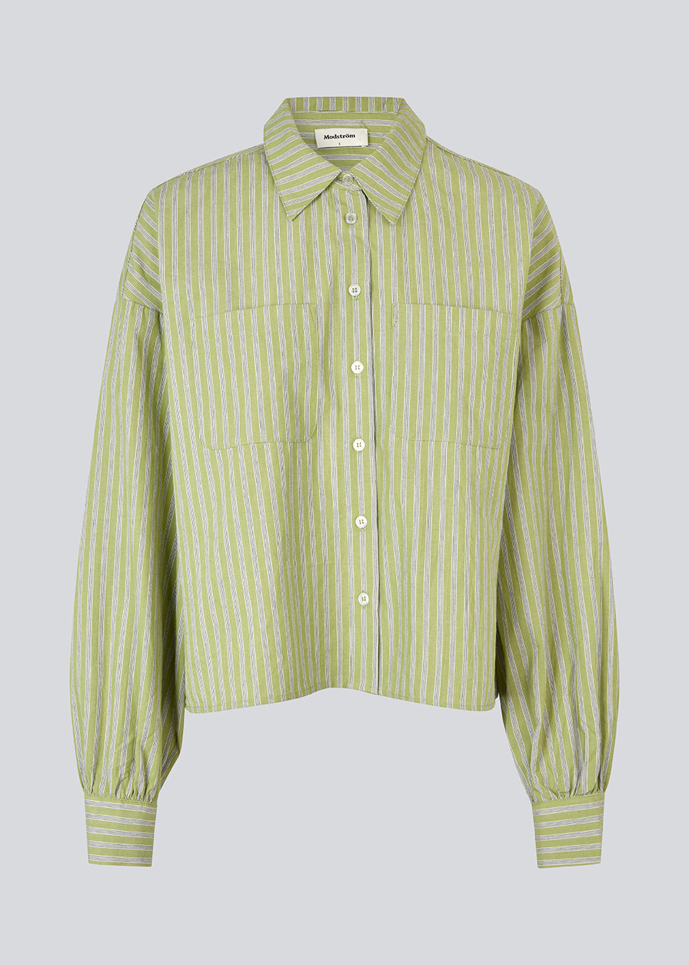 Striped shirt in green with balloon sleeves and feminine details. The UmekoMD Shirt features chest pockets, a classic collar, and button closure – an updated take on the timeless shirt. The model is 175 cm and wears a size S/36.

Material:
73% Cotton
27% Polyester