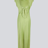 Elegant satin dress in green made from 96% recycled polyester. The UnityMD Dress features short sleeves, an ankle-length silhouette, and beautiful draping at the waist that accentuates the figure. The deep back and tie detail add a feminine and sophisticated touch. The model is 175 cm and wears a size S/36.


Material:
4% Elastane
96% Recycled Polyester