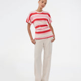 Fitted T-shirt with fresh red and pink stripes. The UrbanMD Stripe T-shirt features short sleeves, a round neckline, and delicate ruched stitching at the waist that accentuates the silhouette. A discreet chest logo completes the modern look. The model is 175 cm and wears a size S/36.

Material:
52% Cotton
48% Polyester