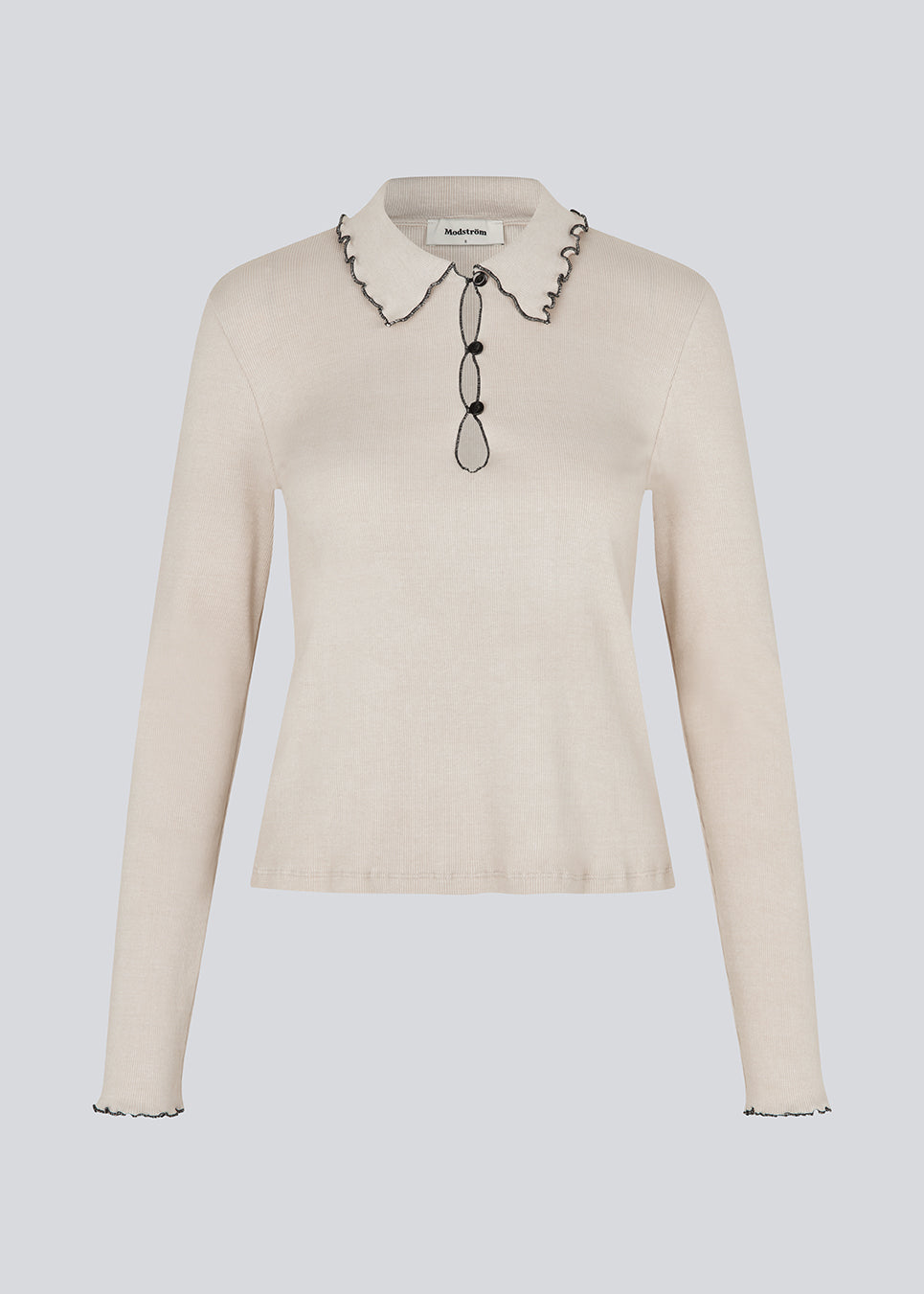 Elegant knitted blouse in beige with contrast stitching. The UrdMD LS Top is made from 100% organic cotton and features a collar, long sleeves, and button detailing. A timeless and feminine choice for any occasion. The model is 175 cm and wears a size S/36. 

Material:
95% Organic Cotton
5% Elastane