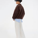 Soft fleece sweater in brown made from 100% recycled polyester. The UrielMD Fleece is designed with a high collar, half-zip closure, and a relaxed fit that creates a modern and effortless look. Perfect for chilly days and casual layering. The model is 175 cm and wears a size S/36.

Material:
100% Recycled Polyester