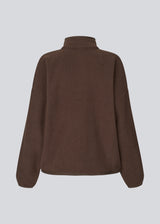 Soft fleece sweater in brown made from 100% recycled polyester. The UrielMD Fleece is designed with a high collar, half-zip closure, and a relaxed fit that creates a modern and effortless look. Perfect for chilly days and casual layering. The model is 175 cm and wears a size S/36.

Material:
100% Recycled Polyester