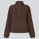 Soft fleece sweater in brown made from 100% recycled polyester. The UrielMD Fleece is designed with a high collar, half-zip closure, and a relaxed fit that creates a modern and effortless look. Perfect for chilly days and casual layering. The model is 175 cm and wears a size S/36.

Material:
100% Recycled Polyester