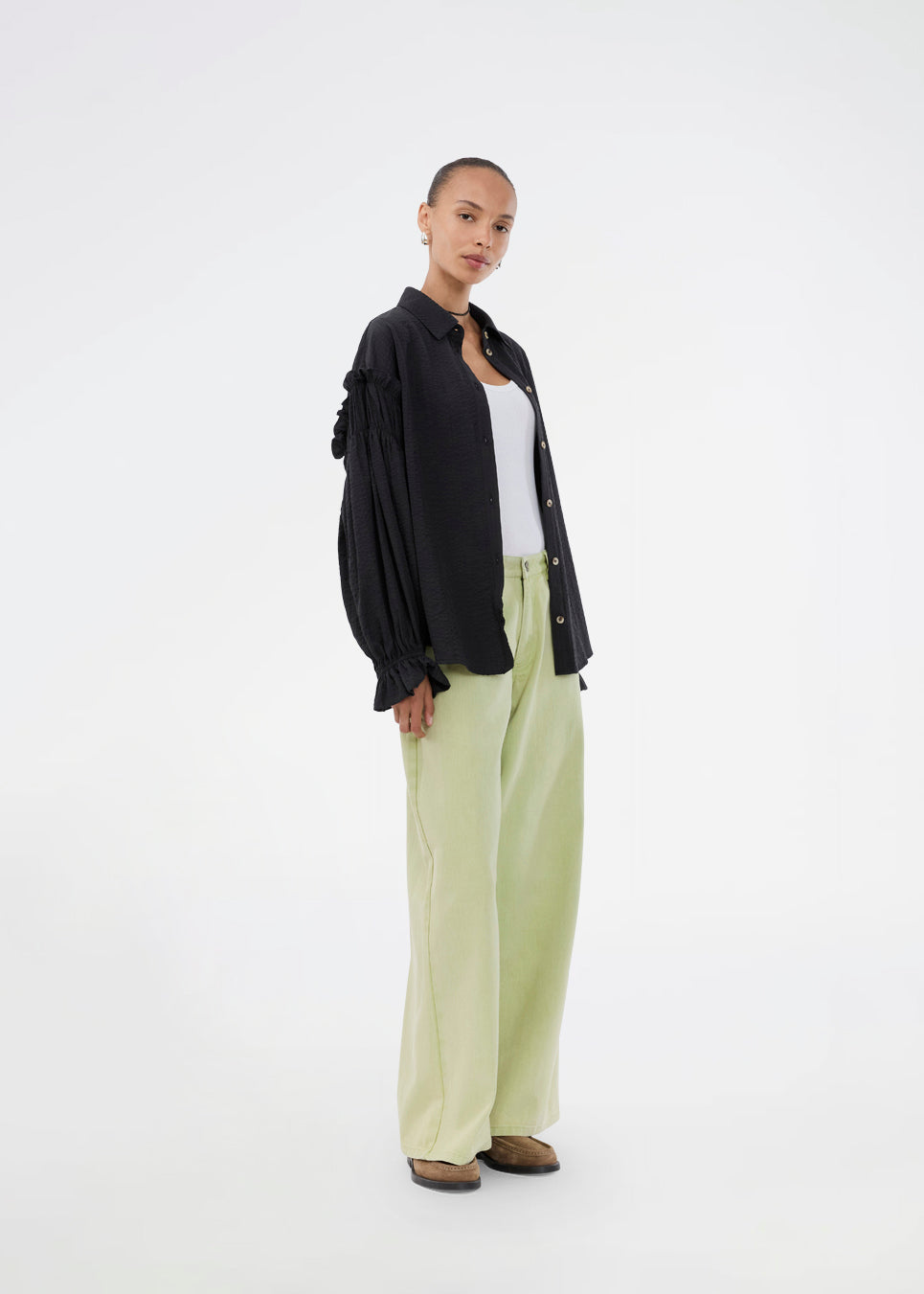 Feminine black shirt with smock and ruffle details. The UlfurMD Shirt features tonal stripes, a collar, button closure, and voluminous sleeves with smock and ruffles – an elegant and modern shirt that adds a sophisticated touch to both everyday and work looks. The model is 175 cm and wears a size S/36.


Material:
40% Cotton
60% Recycled Polyester