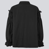 Feminine black shirt with smock and ruffle details. The UlfurMD Shirt features tonal stripes, a collar, button closure, and voluminous sleeves with smock and ruffles – an elegant and modern shirt that adds a sophisticated touch to both everyday and work looks. The model is 175 cm and wears a size S/36.


Material:
40% Cotton
60% Recycled Polyester