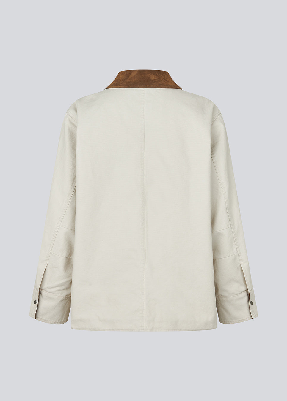 Jacket in beige with a rustic collar and a relaxed fit. The Ursulamd jacket features wide long sleeves, a concealed closure, and a modern, minimalist look – perfect for layering. The model is 175 cm and wears a size S/36.

Material:
100% Cotton

Lining:
100% Cotton

Filling:
100% Polyester