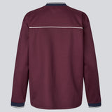 Dark red tracksuit top made from 100% recycled polyester. Utopiamd LS t-shirt has long sleeves, a v-neck with contrast details and a front logo.