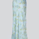 Elegant maxi skirt in blue with a romantic floral print. The UttaMD Print Skirt is made from 100% recycled polyester and features a flattering cut that drapes beautifully, creating a feminine look. The model is 175 cm and wears a size S/36.

Material:
100% Recycled Polyester