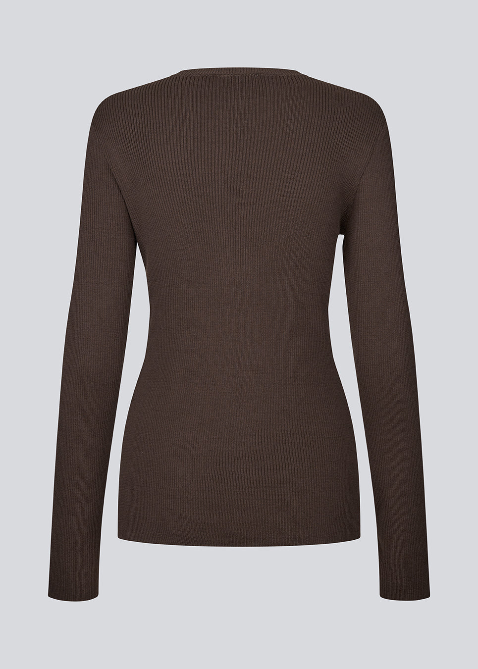 Timeless rib-knit cardigan in brown with a round neckline and front button closure. The UvisMD Cardigan features a fitted silhouette and a soft quality that gives it a feminine and elegant look. Perfect for everyday wear and layering through the seasons. The model is 175 cm and wears a size S/36.

Material:
100% Organic Cotton