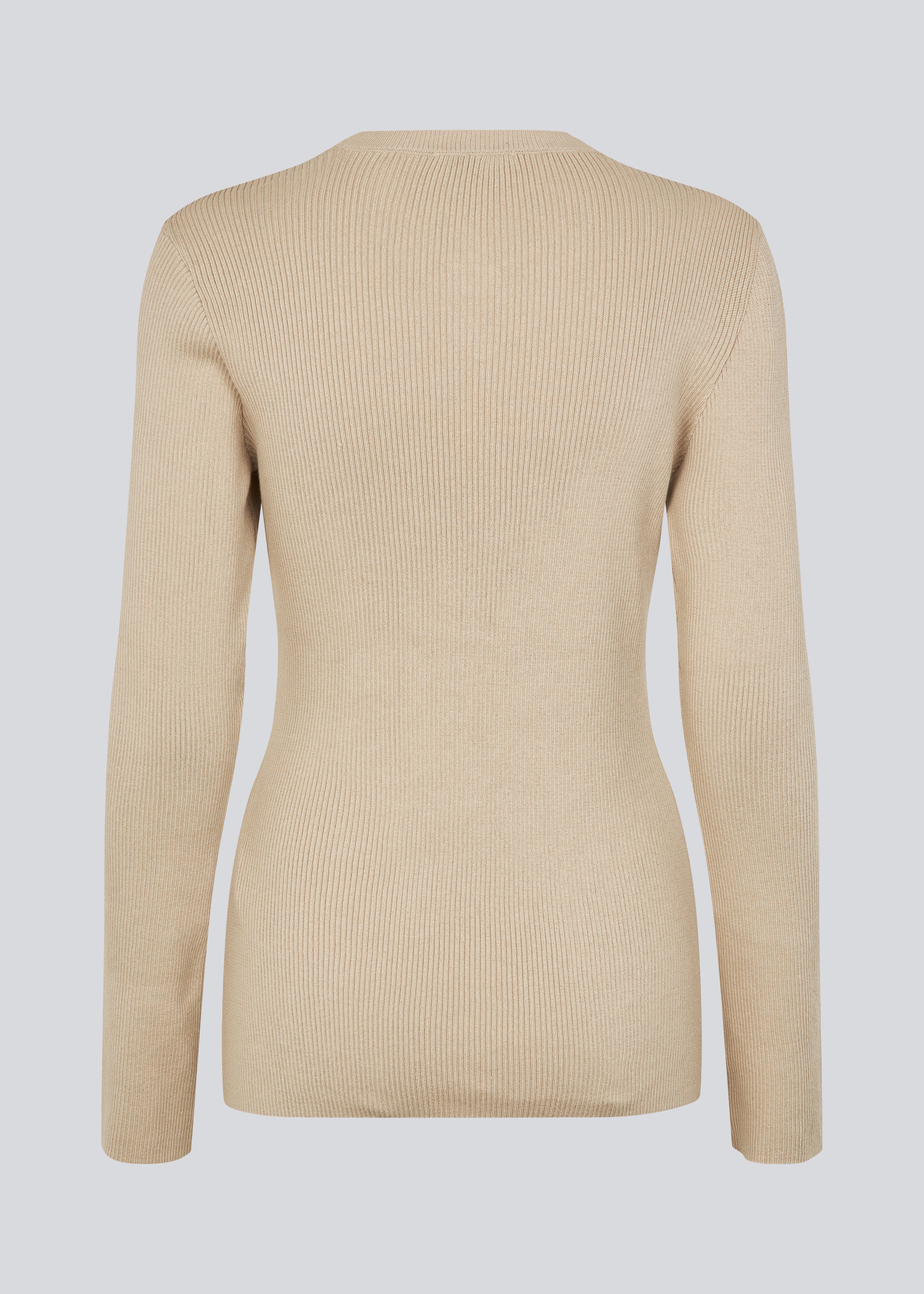 Timeless rib-knit cardigan in beige with a round neckline and front button closure. The UvisMD Cardigan features a fitted silhouette and a soft quality that gives it a feminine and elegant look. Perfect for everyday wear and layering through the seasons. The model is 175 cm and wears a size S/36.



Material:
100% Organic Cotton