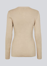 Timeless rib-knit cardigan in beige with a round neckline and front button closure. The UvisMD Cardigan features a fitted silhouette and a soft quality that gives it a feminine and elegant look. Perfect for everyday wear and layering through the seasons. The model is 175 cm and wears a size S/36.



Material:
100% Organic Cotton