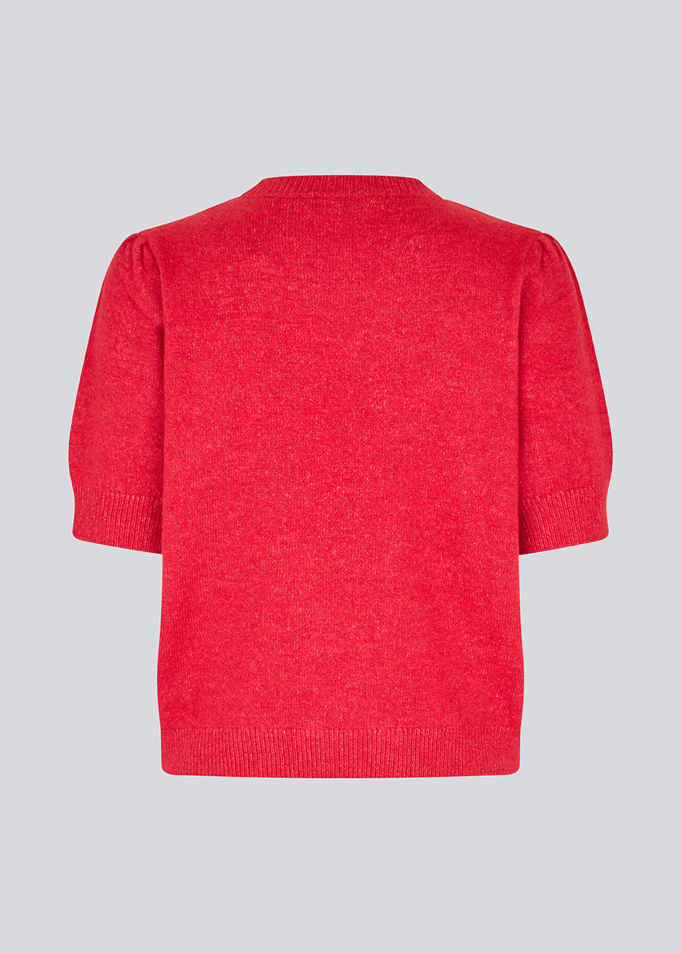 Feminine knit sweater in red with short sleeves and a subtle puff. The UzziMD SS O-neck features a round neckline and delicate ribbed trims, creating an elegant and timeless look. The model is 175 cm and wears a size S/36.


Material:
76% Acrylic
24% Polyester