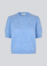 Feminine light blue knit sweater with short sleeves and a subtle puff. The UzziMD SS O-neck features a round neckline and delicate ribbed trims, creating an elegant and timeless look.

Material:
76% Acrylic
24% Polyester