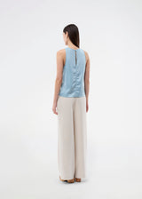 Sleeveless top in blue in lustrous satin. The Valdomd Top features a round neckline, vertical stitching detail at the front, and a button closure at the back for an elegant look. Made from 98% recycled polyester&nbsp;