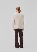 Nice knit with long sleeves in white. Valentia o-neck has a rib edge at the neck, sleeves and bottom. The knit has a loose fit, which makes it perfect for the cold days.