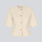 Short-sleeved, tailored blazer. The VesMD blazer features short sleeves and a round neckline. The elegant front button closure adds a sophisticated touch and allows the blazer to also be styled as a top.