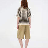 Elegant and lightweight cardigan in navy and beige in a beautifully knitted openwork pattern with stripes. The VesterMD Stripe cardigan features short sleeves, a collar, and an adjustable drawstring closure at the front, creating a feminine and relaxed look. Made from 100% organic cotton for soft and breathable comfort.
