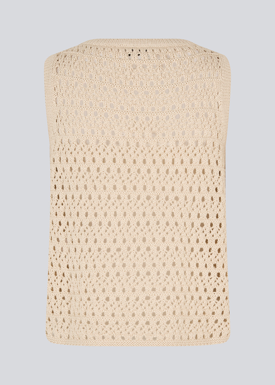 Knitted sleeveless top in beige with an openwork pattern, perfect for layering. The VesterMD top is made from 100% organic cotton and features a classic round neckline.&nbsp;
