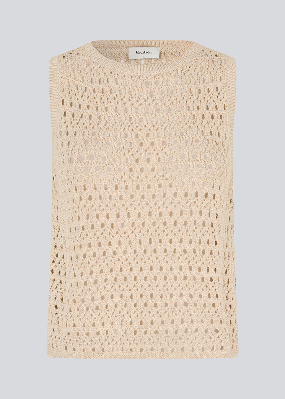 Knitted sleeveless top in beige with an openwork pattern, perfect for layering. The VesterMD top is made from 100% organic cotton and features a classic round neckline.&nbsp;
