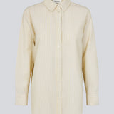 Long, classic striped shirt in light yellow. The ViggeMD Stripe Shirt features timeless details such as a collar, button closure, and cuffs, along with a high slit at the back that adds a modern twist to the otherwise simple design.&nbsp;
