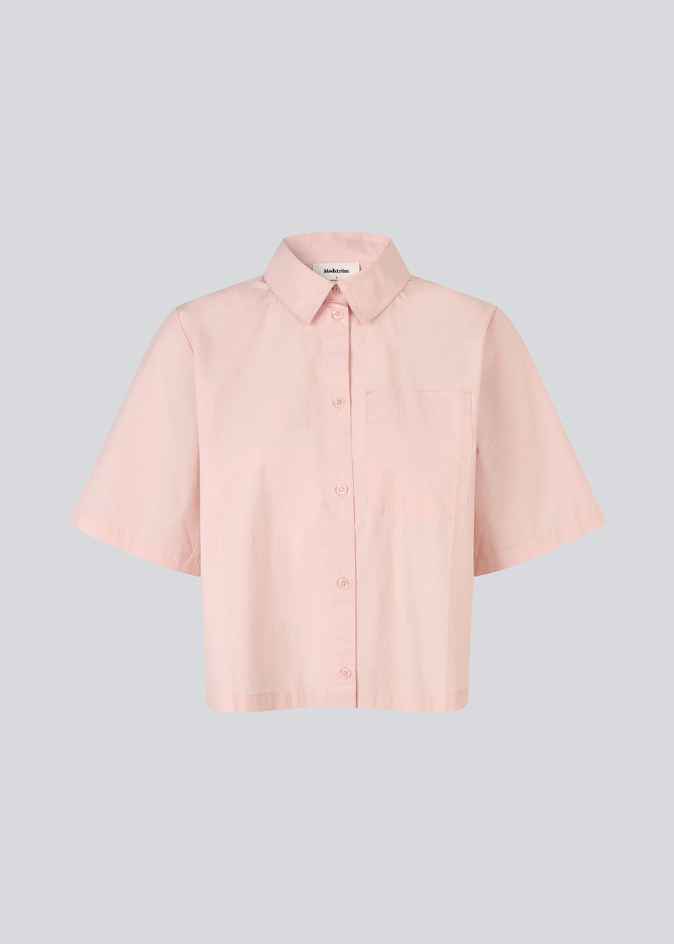 Short shirt with wide short sleeves. The VilbertMD shirt is made from 100% organic cotton and features classic details such as a collar, button closure, and chest pocket.
