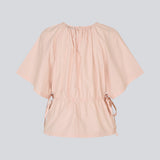 Vilbertmd top is designed with soft pleats at the neckline, short wide sleeves, and a side tie detail that creates a relaxed yet refined look. An elegant style that can easily be dressed up or down in the modern wardrobe.