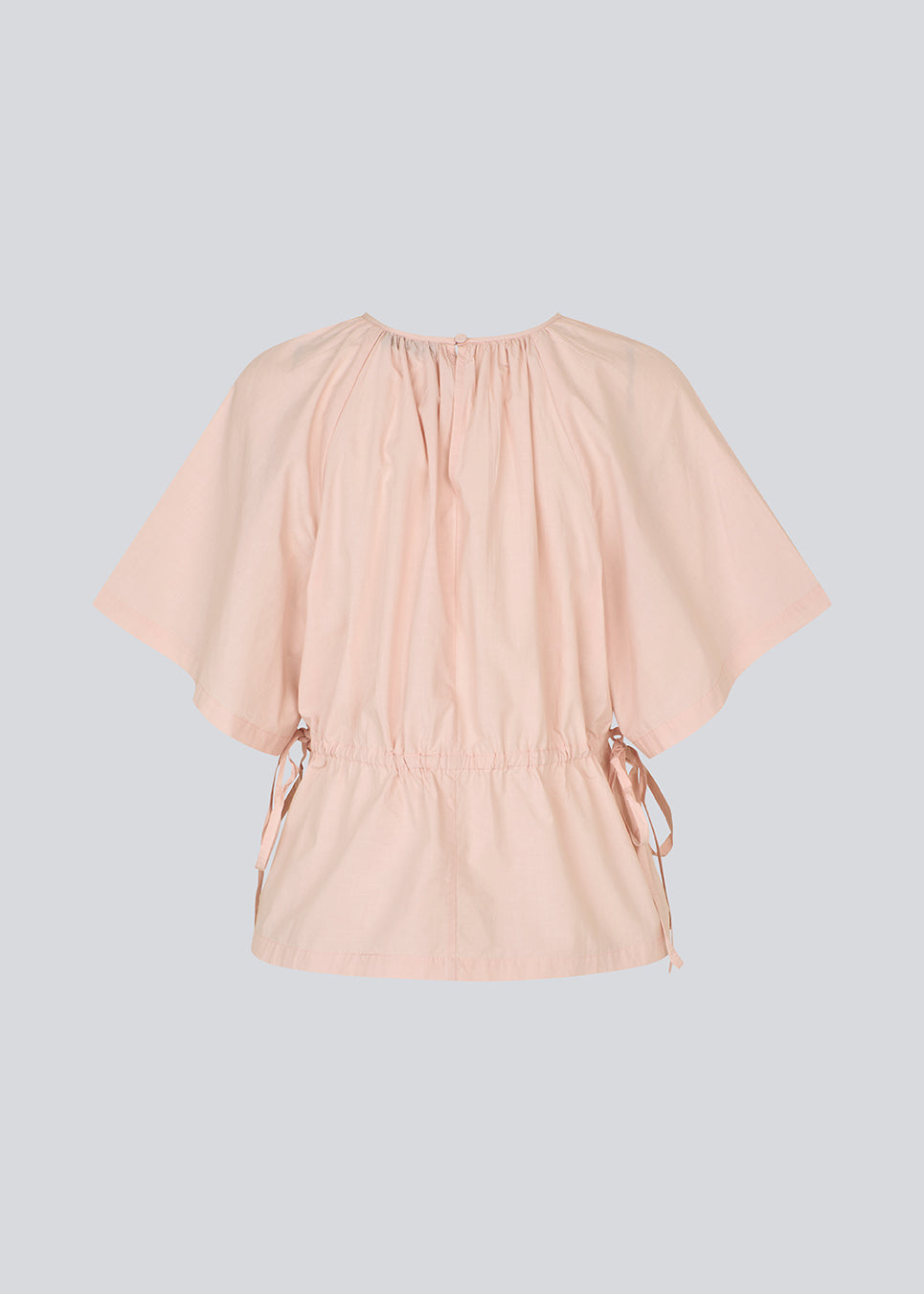 Vilbertmd top is designed with soft pleats at the neckline, short wide sleeves, and a side tie detail that creates a relaxed yet refined look. An elegant style that can easily be dressed up or down in the modern wardrobe.