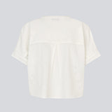 Short-sleeved shirt-blouse with a solid-color print. The VilleminMD shirt features a button closure, round neckline, and rolled-up sleeves, with a length that reaches the waistband. A timeless and elegant choice that can easily be styled for both everyday and evening wear.