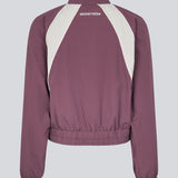 Tracksuit jacket in purple in 100% recycled nylon. Volmermd jacket has contrast panels, a high neck and a zipperclosure in front.