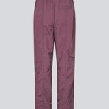 Tracksuitpants in purple in 100% recycled nylon. Volmermd pants have piping along the sideseam and cutline details for a sporty look.