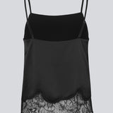 Delicate satin top in black with lace details on the bottom. Vuemd top has adjustable straps and refined lace details at the hem. Perfect worn alone or styled as part of a layered look.