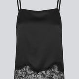 Delicate satin top in black with lace details on the bottom. Vuemd top has adjustable straps and refined lace details at the hem. Perfect worn alone or styled as part of a layered look.