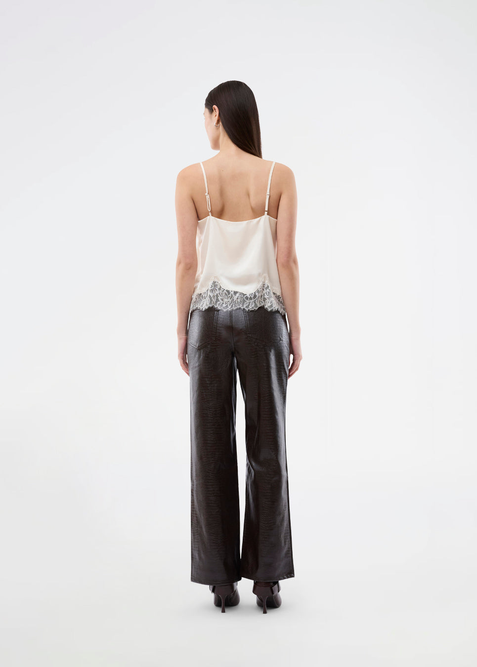 Delicate satin top in white/cream with lace details. Vuemd top has adjustable straps and refined lace details at the hem. Perfect worn alone or styled as part of a layered look.