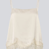 Delicate satin top in white/cream with lace details. Vuemd top has adjustable straps and refined lace details at the hem. Perfect worn alone or styled as part of a layered look.