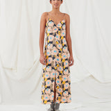 Midi dress in a relaxed fit and floral print. DustinMD print strap dress has a v-neck with ruched details in the center, narrow straps, and zipper in the back. Slit in front. The model is 177 cm and wears a size S/36.  Material: