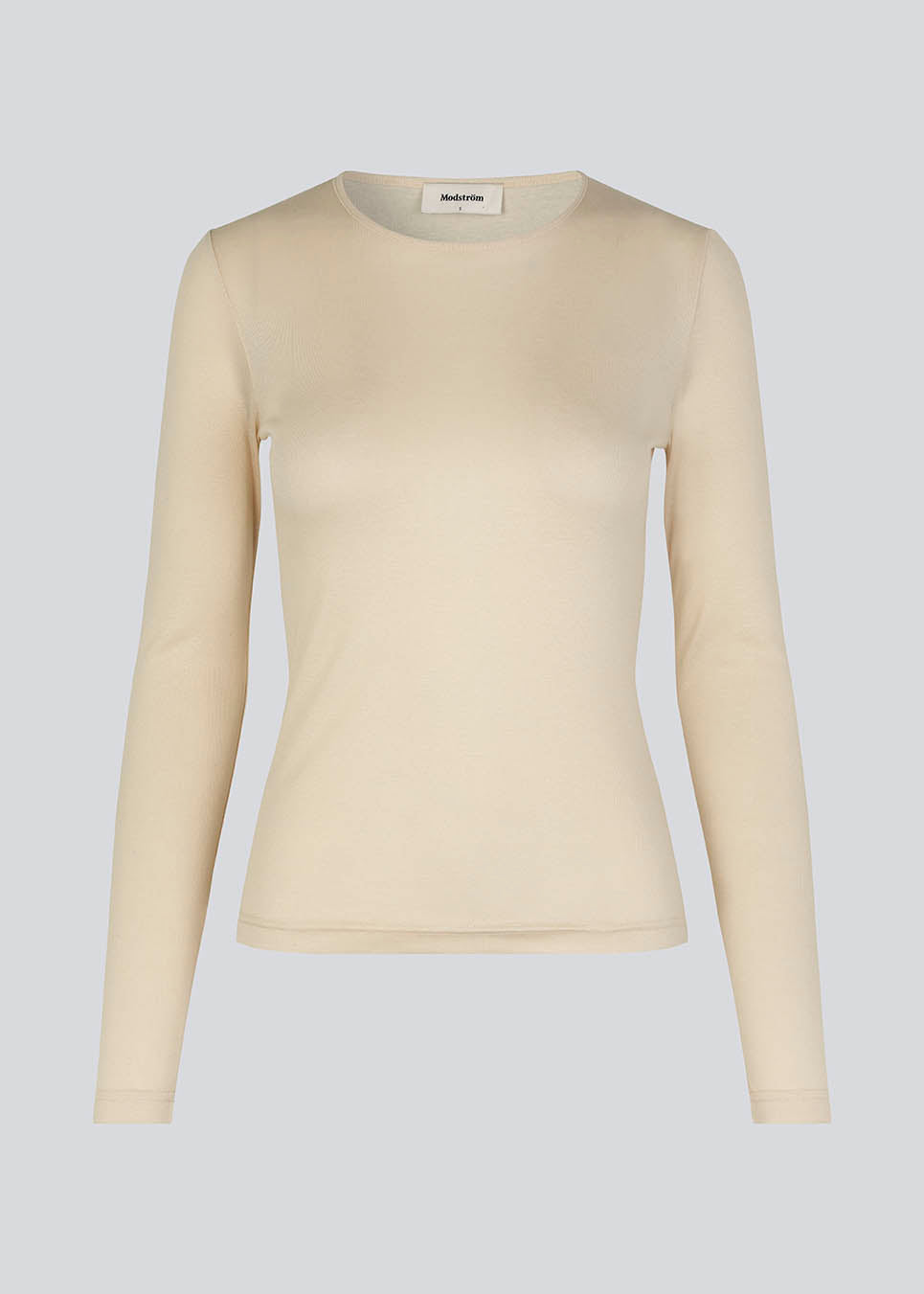 HarperMD LS top in beige is a slim-fitting top with long sleeves and a round neck made from a thin, soft jersey. 