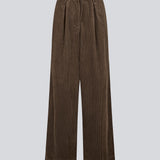 Suit trousers with pleats in corduroy. Pablomd wide pants has long wide legs with sidepockets.