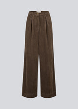 Suit trousers with pleats in corduroy. Pablomd wide pants has long wide legs with sidepockets.