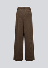 Suit trousers with pleats in corduroy. Pablomd wide pants has long wide legs with sidepockets.