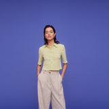 Cropped shirt in a structured woven quality with a regular fit. HamsonMD shirt has a collar, button closure in front, and short sleeves. The model is 175 cm and wears a size S/36.