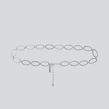 Cool minimalist accessory. TracyMD belt is designed as a slim chain with oval links and an adjustable closure, adding a refined, modern touch. Perfect for defining the waist and elevating both dresses and trousers with a clean, polished finish