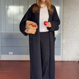 Blue cable-knit pants. The Josefinemd knit pants are soft, relaxed trousers with wide legs. Perfect for cozy days at home or long flights – a comfortable fit with a luxurious look.
Josefine Vogt (165 cm) and the model (177 cm) are both wearing size Small.